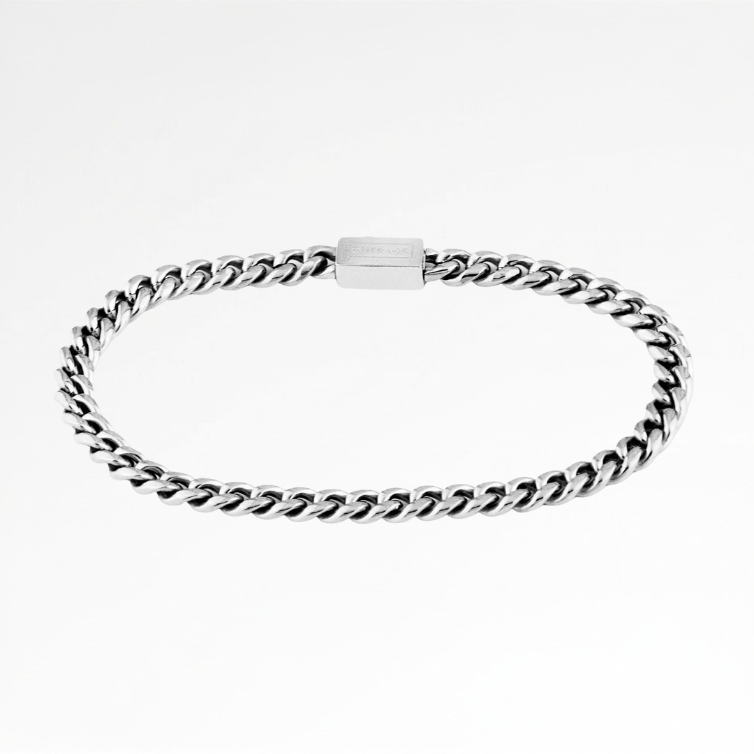 Silver chain bracelet on a white background