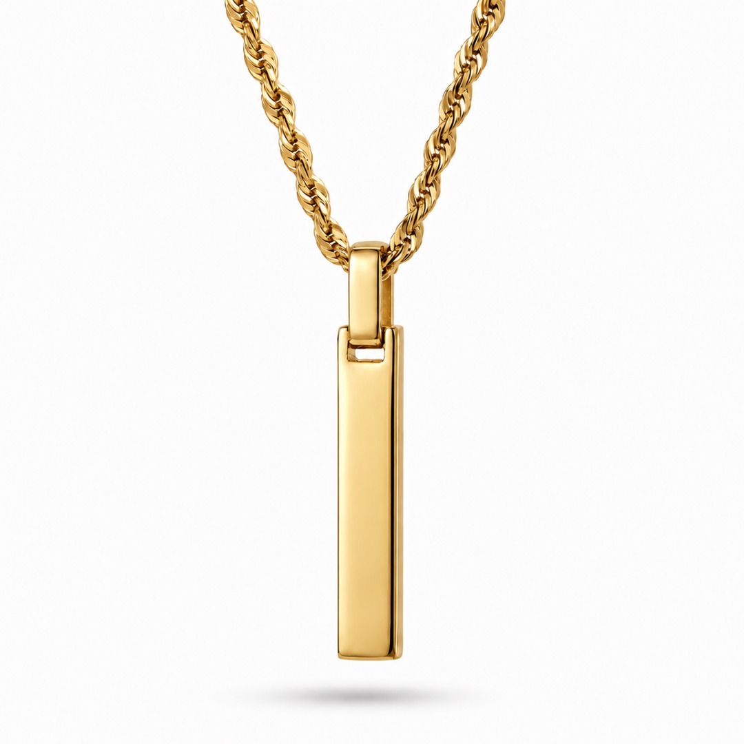 A gold-plated vertical bar pendant necklace on a twisted rope chain, shown against a plain white background with a soft shadow.