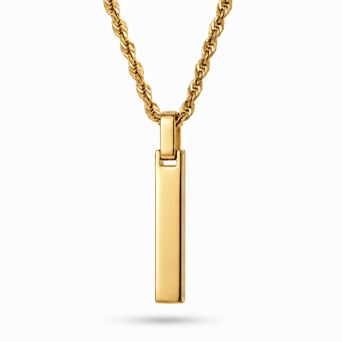 A gold-plated vertical bar pendant necklace on a twisted rope chain, shown against a plain white background with a soft shadow.